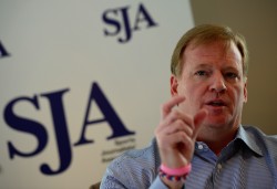 NFL Commissioner Roger Goodell talks to members of the Sports Journalists' Association during a SJA Media Lunch in  October 2013